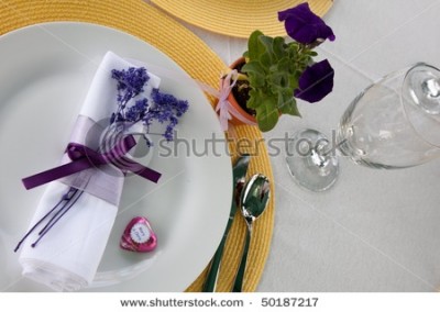 stock-photo-purple-or-violet-wedding-place-setting-with-yellow-place-mats-and-a-pink-chris-and-mary-chocolate-50187217.jpg