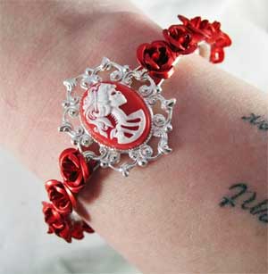 red-cameo-on-silver-filigree-cuff.jpg